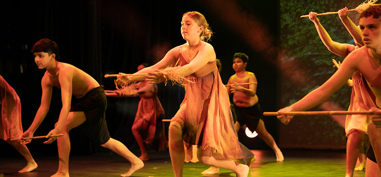 seven students dancing